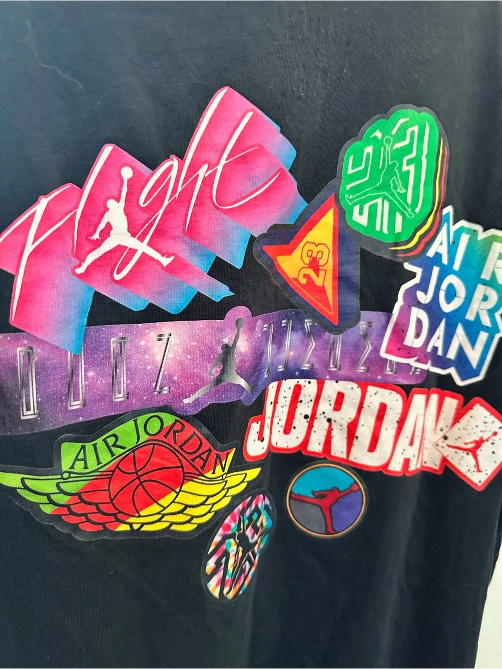 Jordan Black Tee with Multicolor Retro Badge Graphics